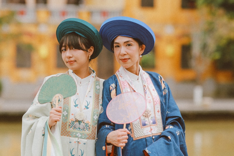 Beautiful women in exquisite traditional Vietnamese fashion