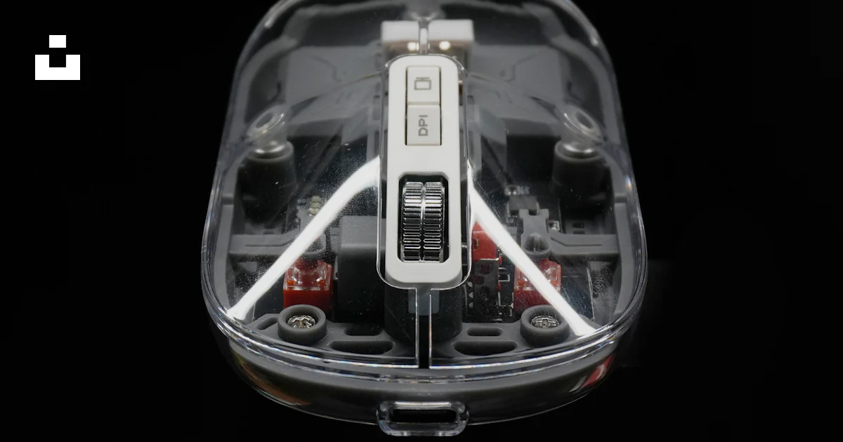 Transparent Computer Mouse Toy Insside Transparent computer mouse on black background photo – Free Dark ...