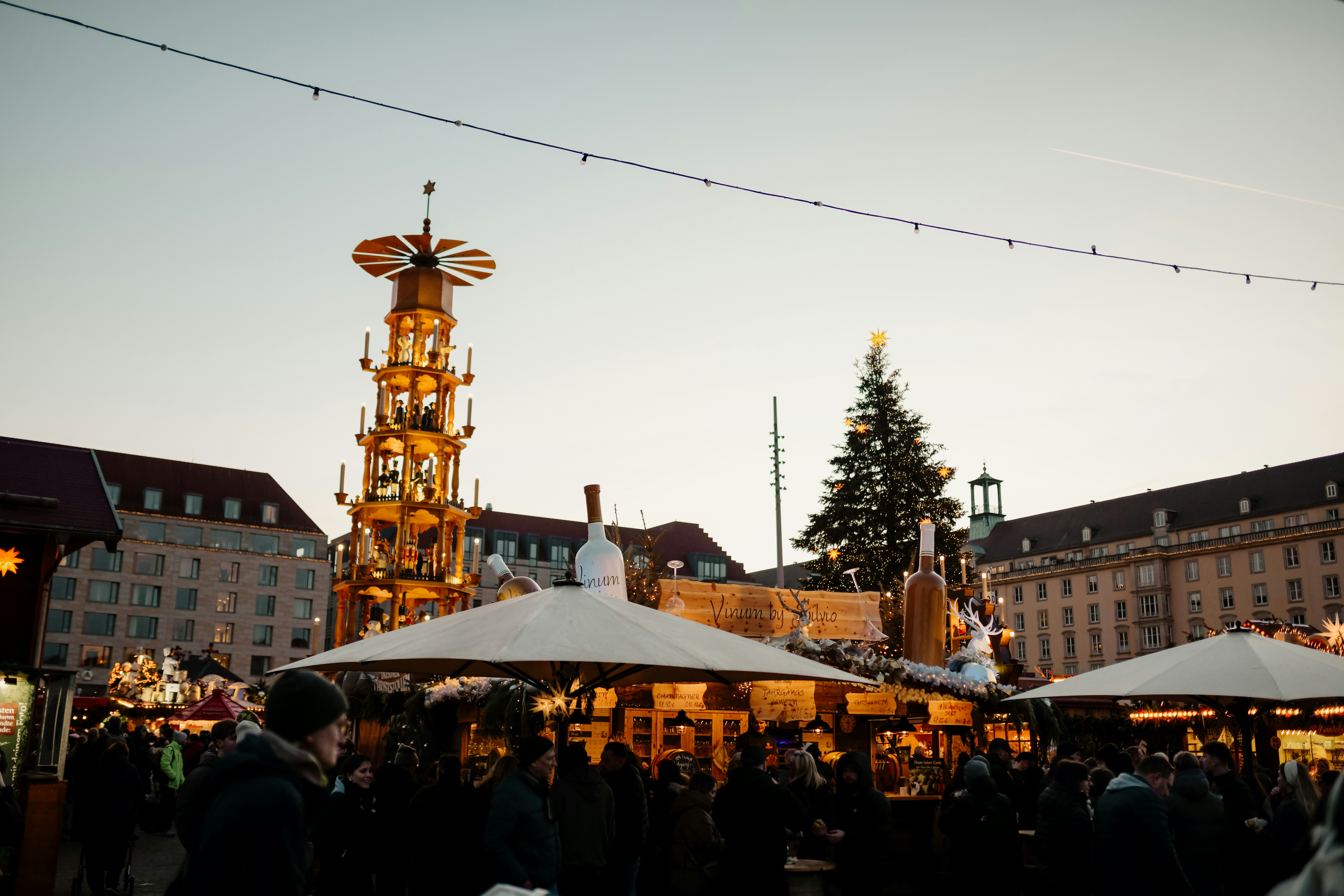 Christmas market with stalls and festive tree