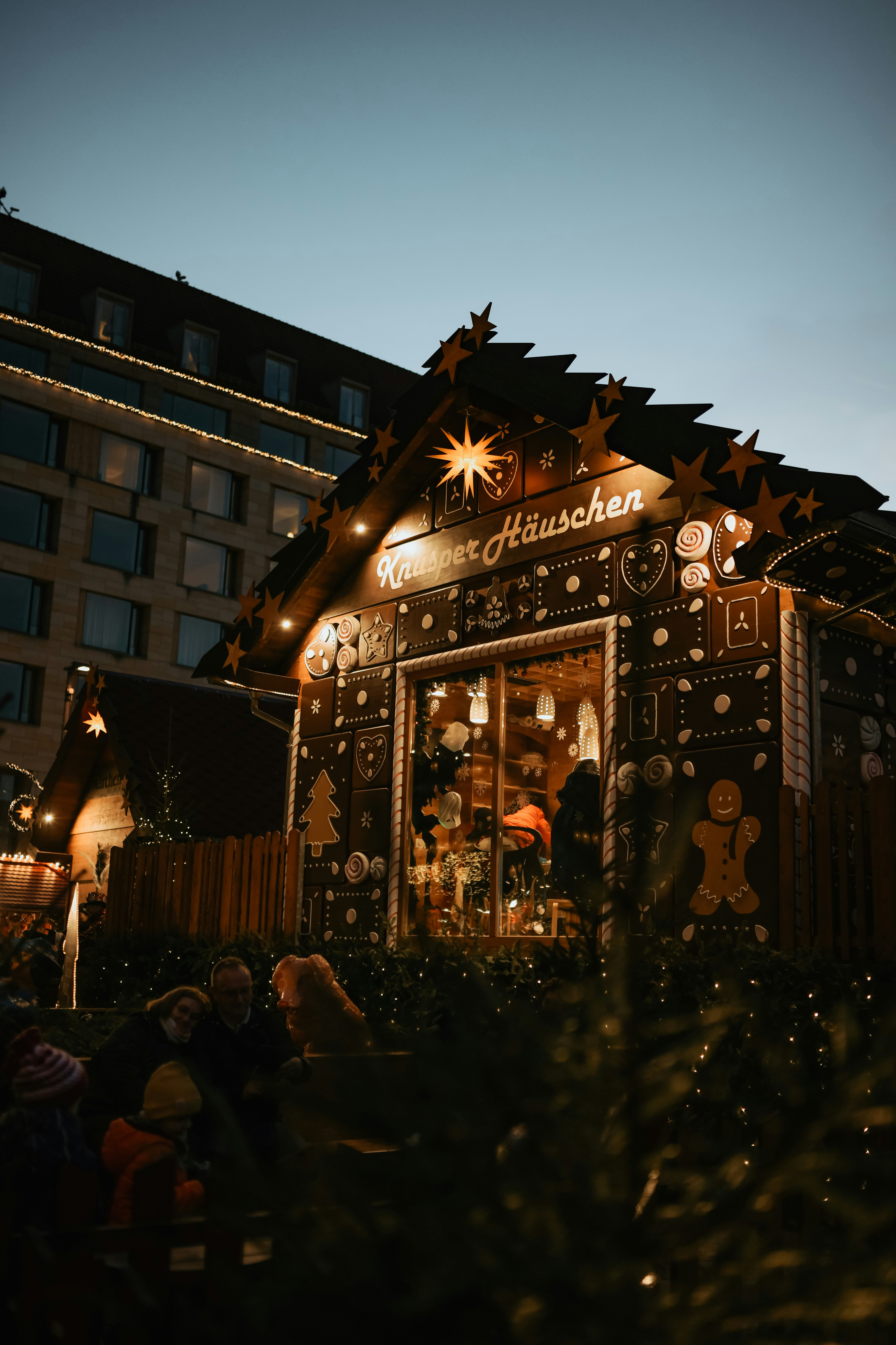 Decorated gingerbread house at a christmas market