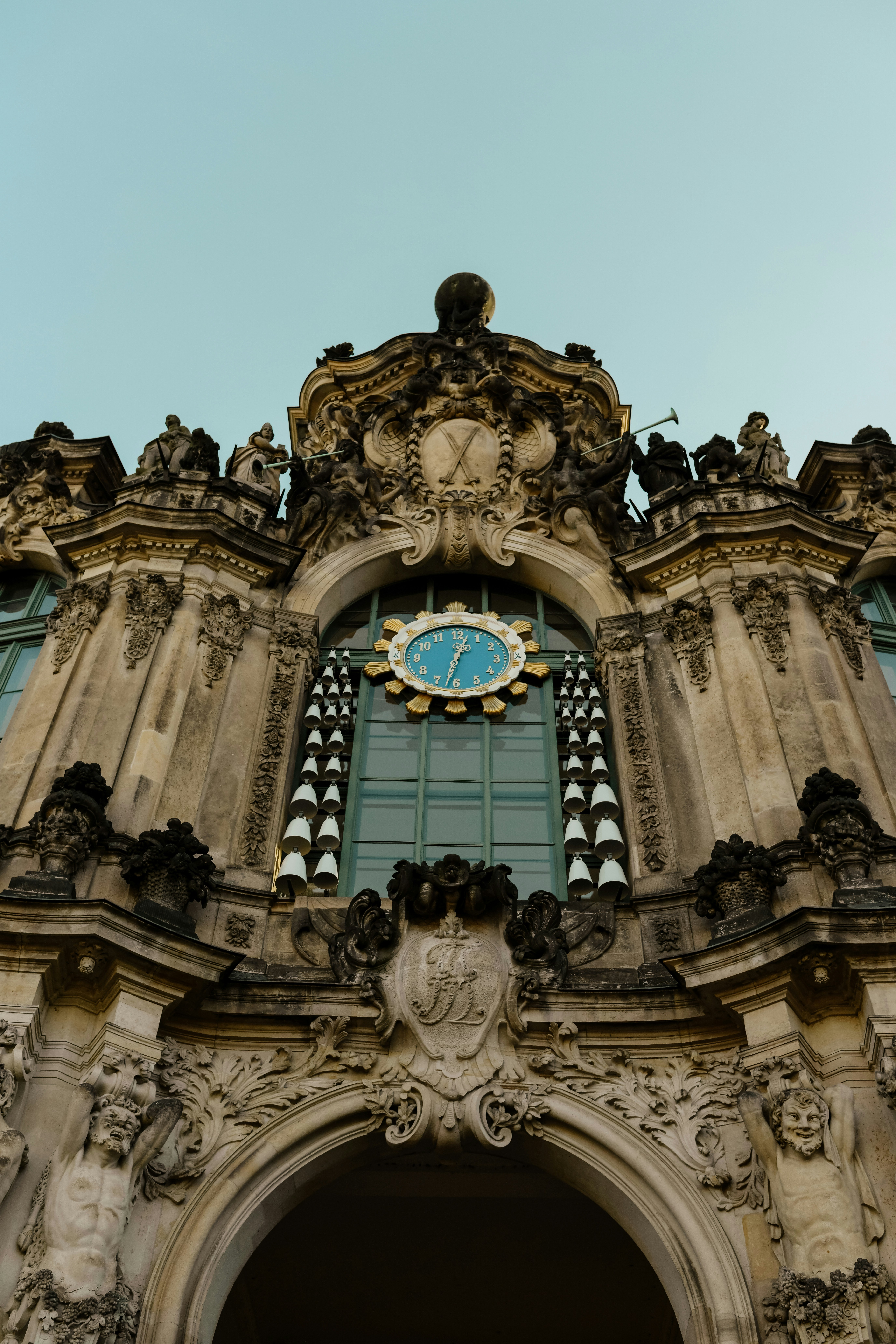 Ornate baroque building facade with a clock