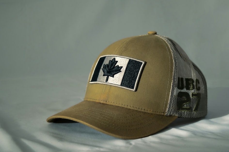 Tan baseball cap with canadian flag patch