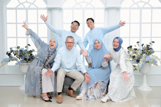 A happy family poses for a group portrait.