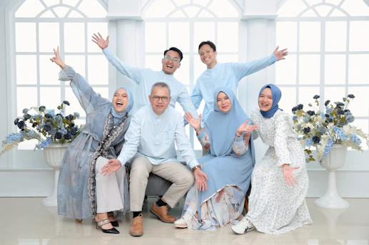 A happy family poses for a group portrait.