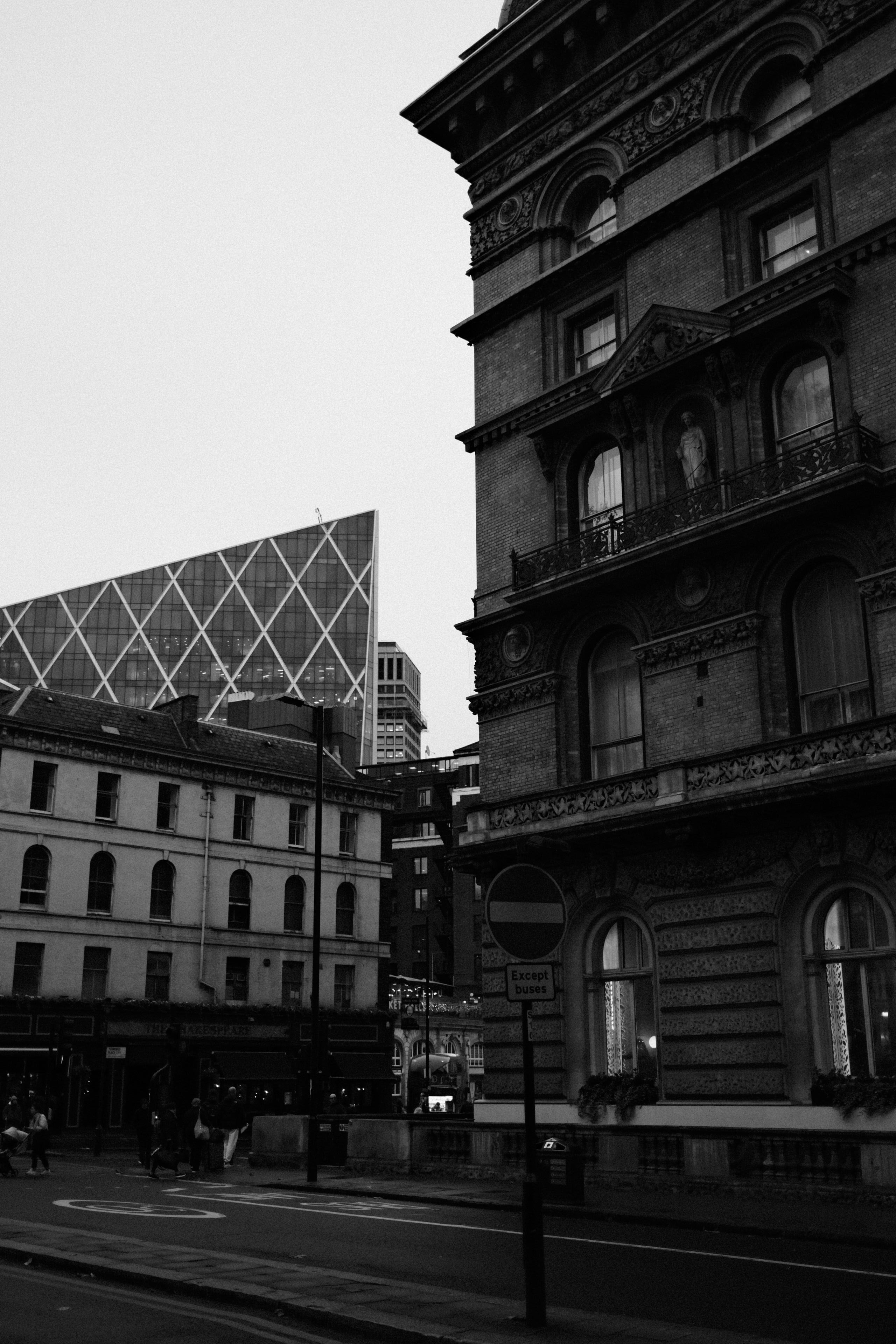 Ornate building contrasts with modern architecture