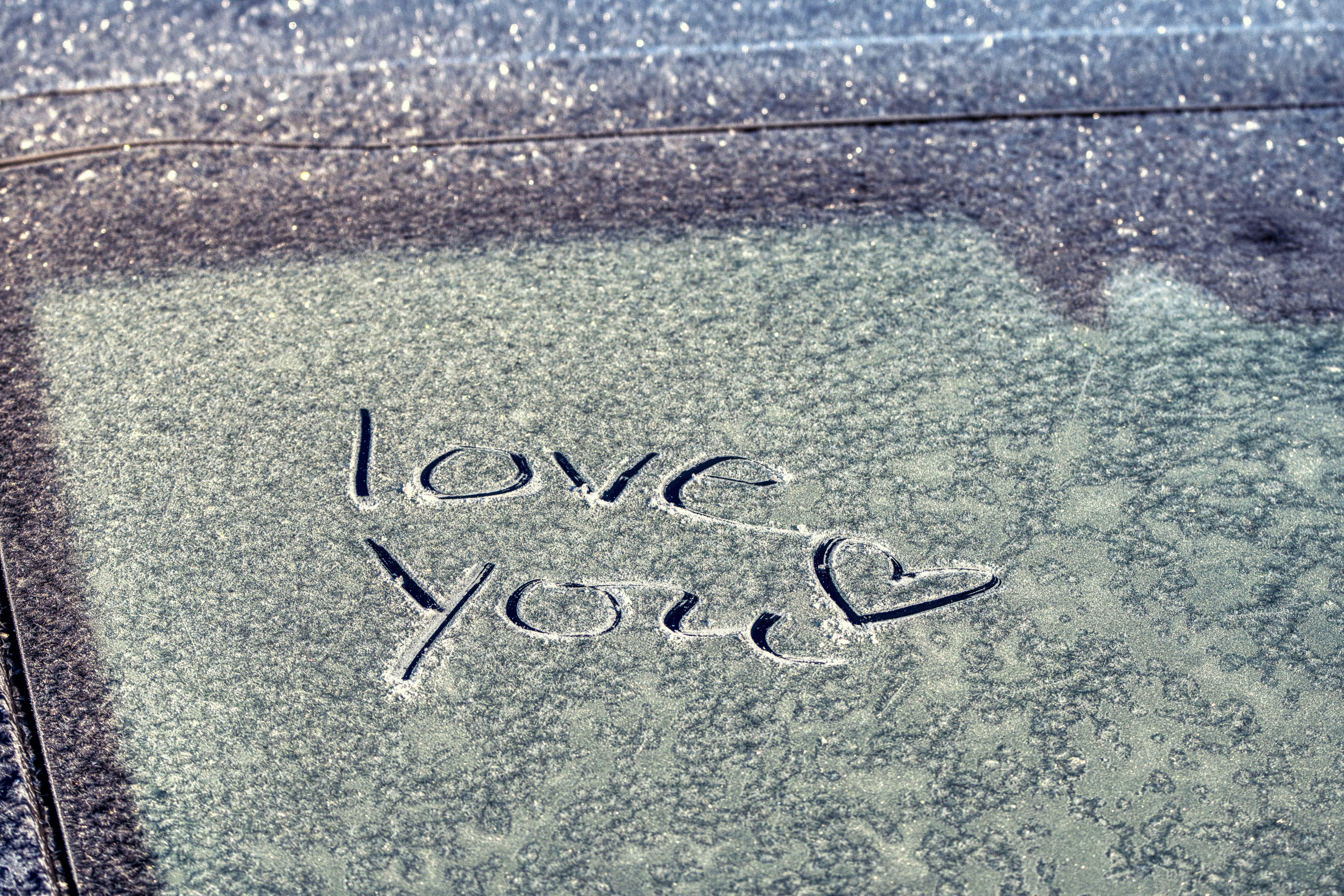 Love you written in frost on a window