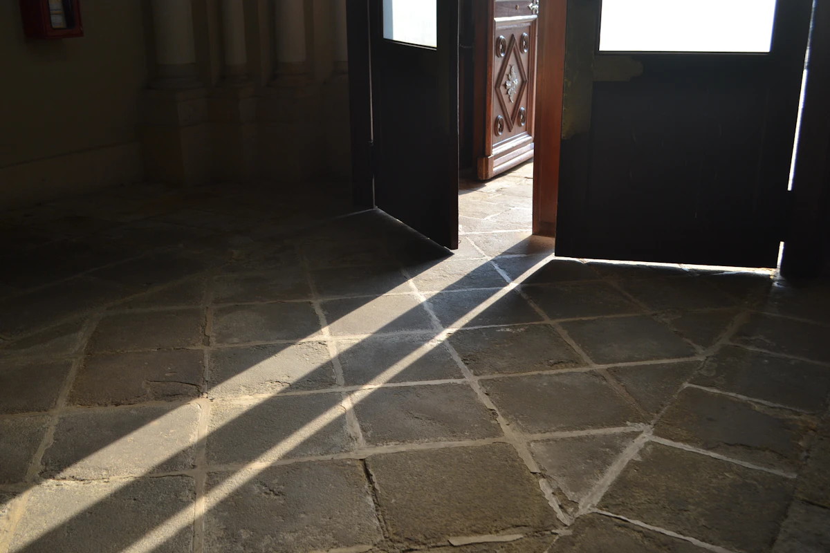 Sunrise light pouring through an open doorway, a fresh beginning