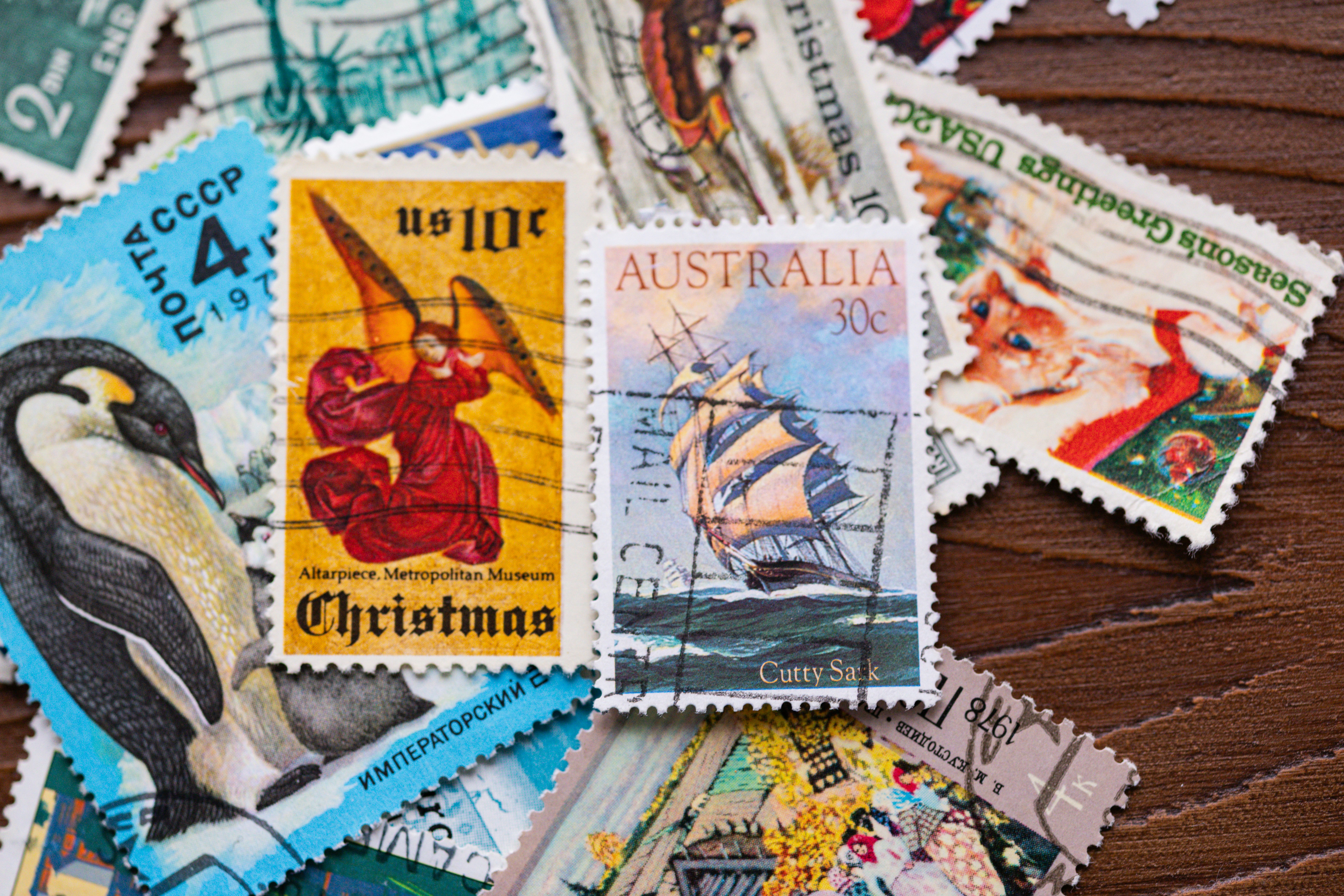 Collection of various vintage postage stamps.