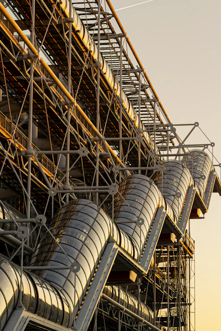 Modern building exterior with glass tubes and metal structure