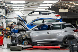 Cars being repaired in a workshop