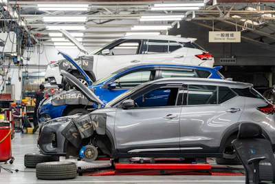Cars being repaired in a workshop
