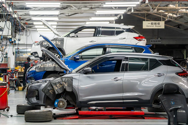Cars being repaired in a workshop
