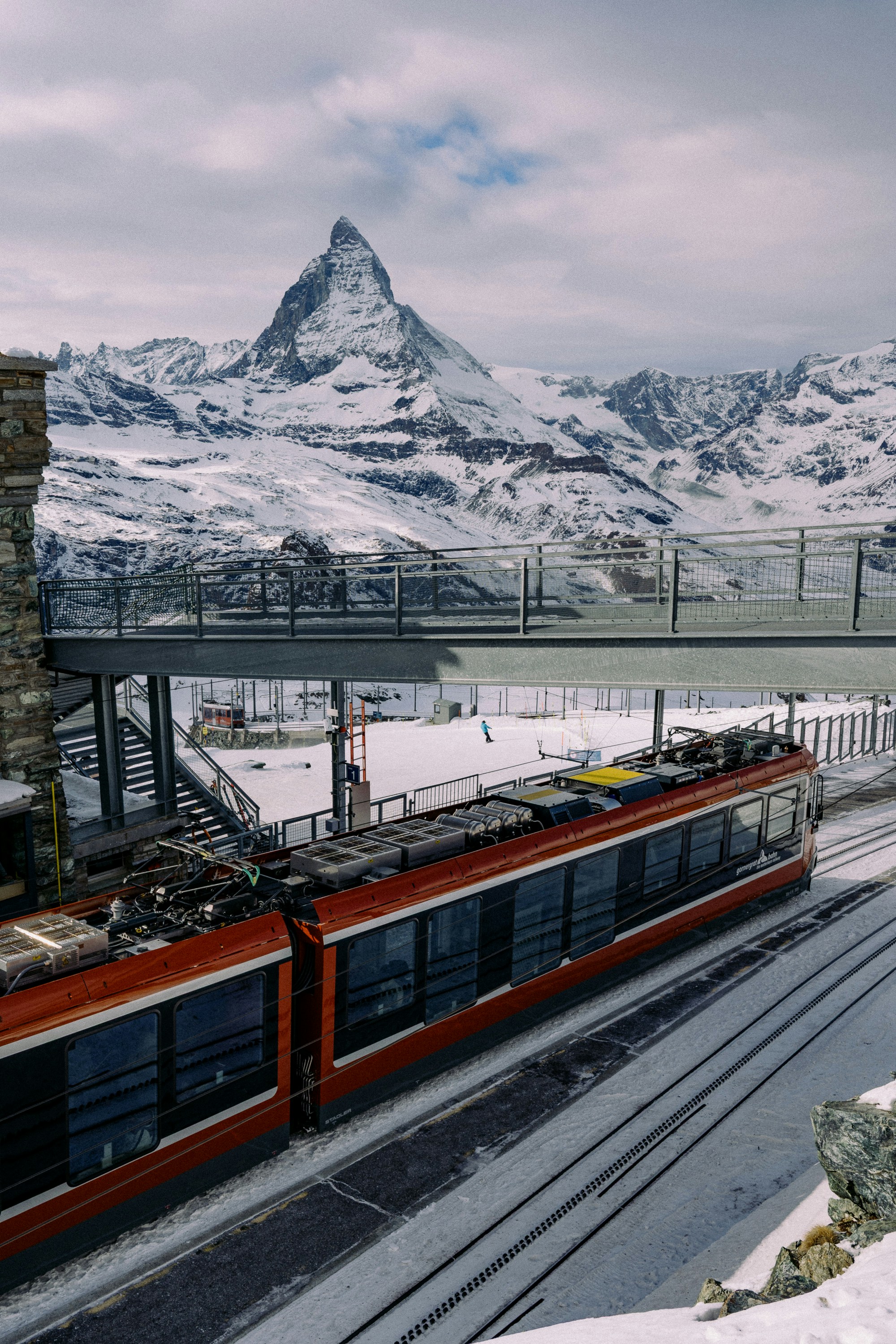 Red train with matterhorn mountain in background