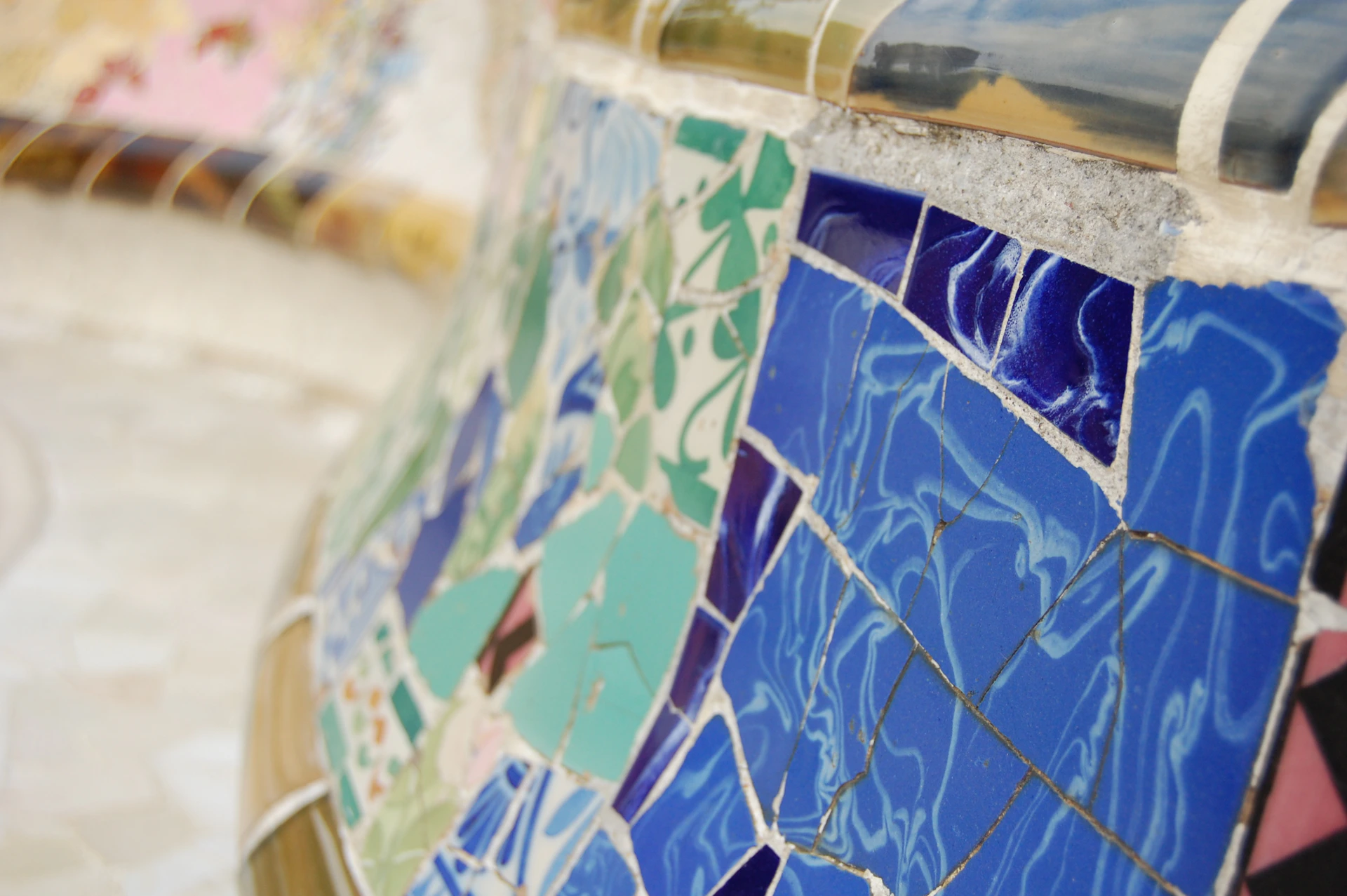 Colorful mosaic tiles on a curved surface