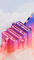 Silver balls rolling down a colorful maze structure