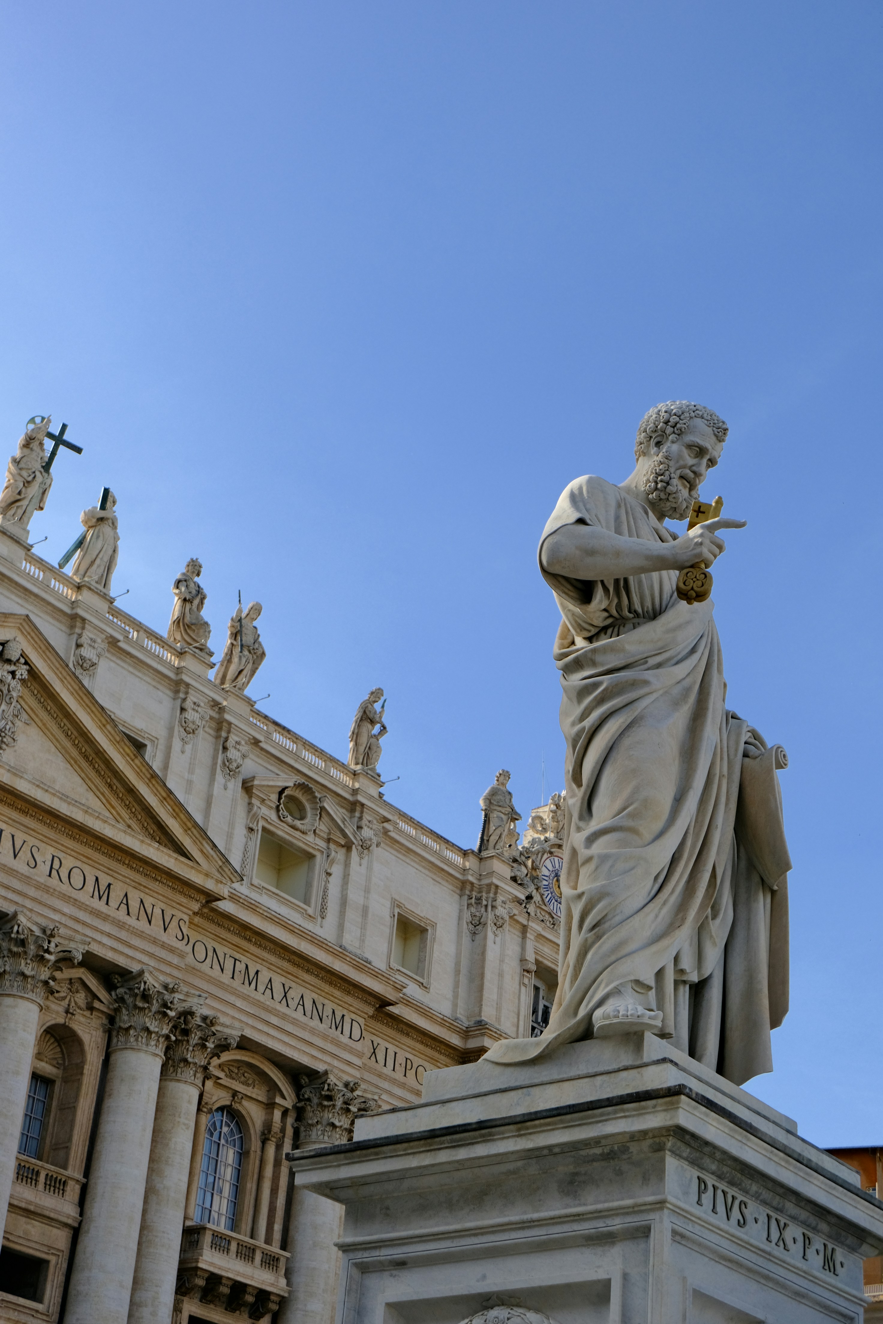 Statue in front of st. peter's basilica, vatican city.