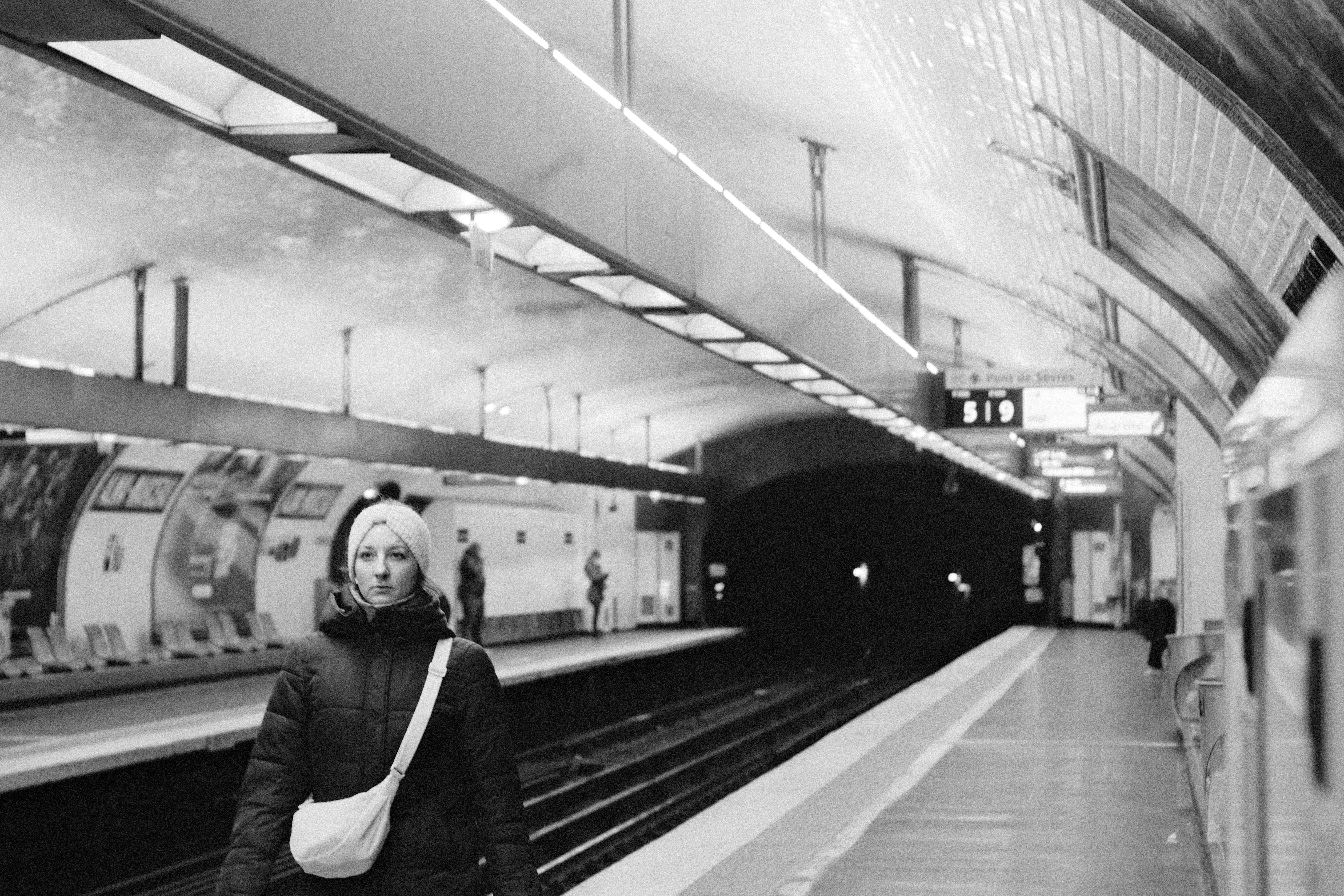 Woman walking on a subway platform