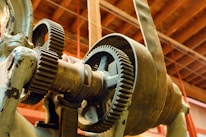 Close-up of old industrial gears and machinery.