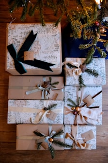 Wrapped christmas gifts under a decorated tree