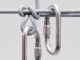 Two carabiners attached to a rope knot