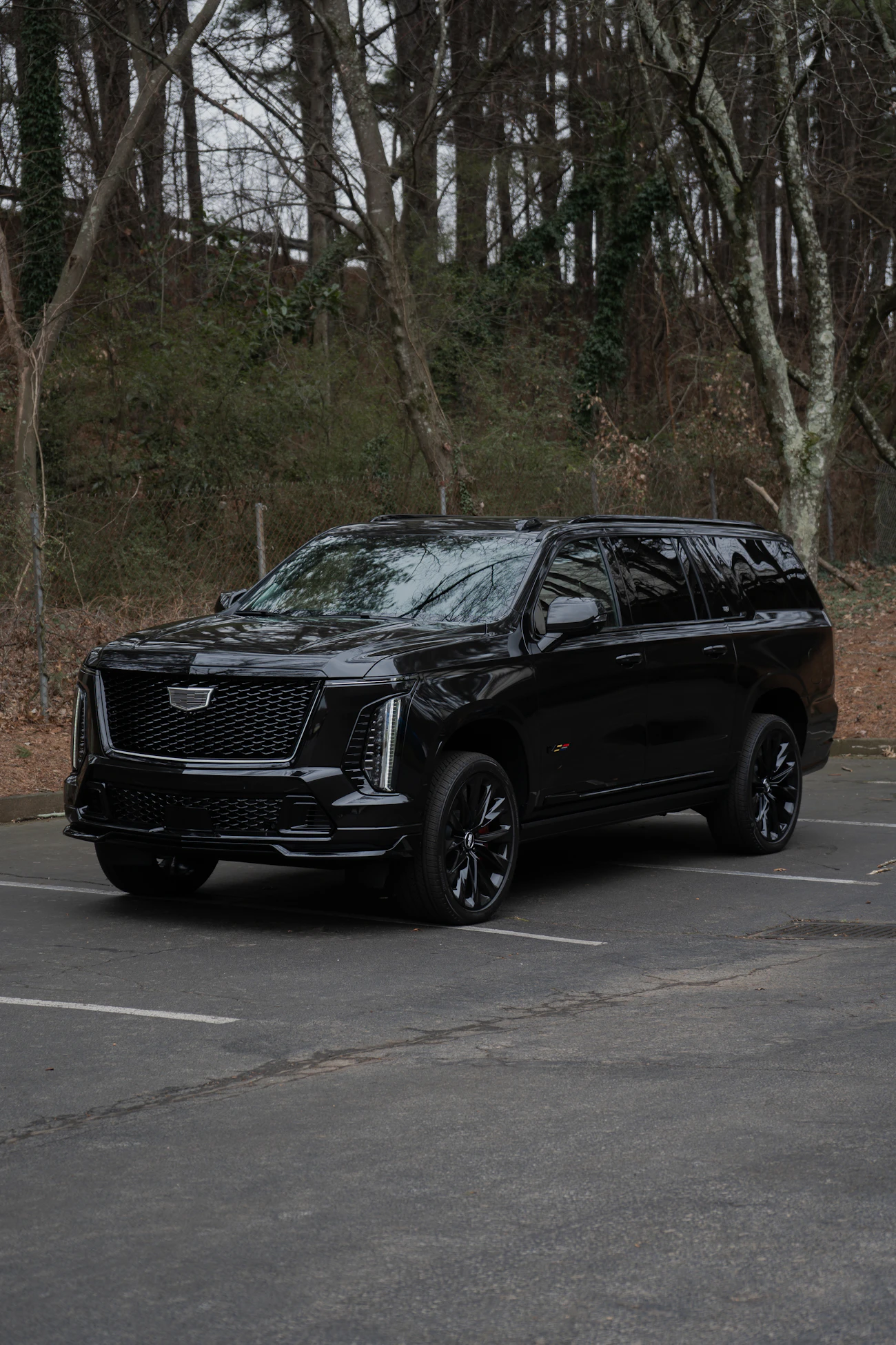 Black Cadillac Escalade luxury SUV