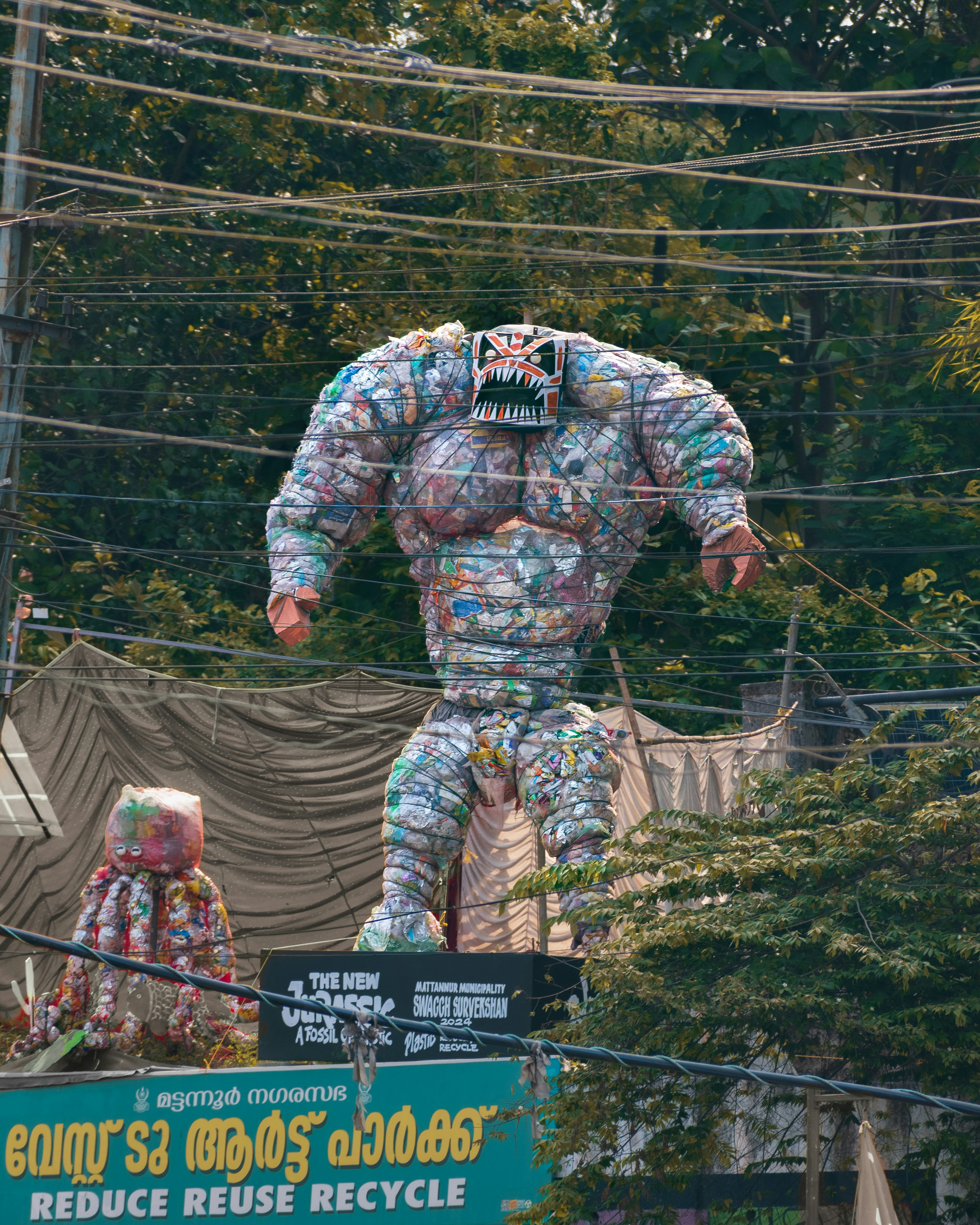 Giant monster sculpture made of plastic bottles