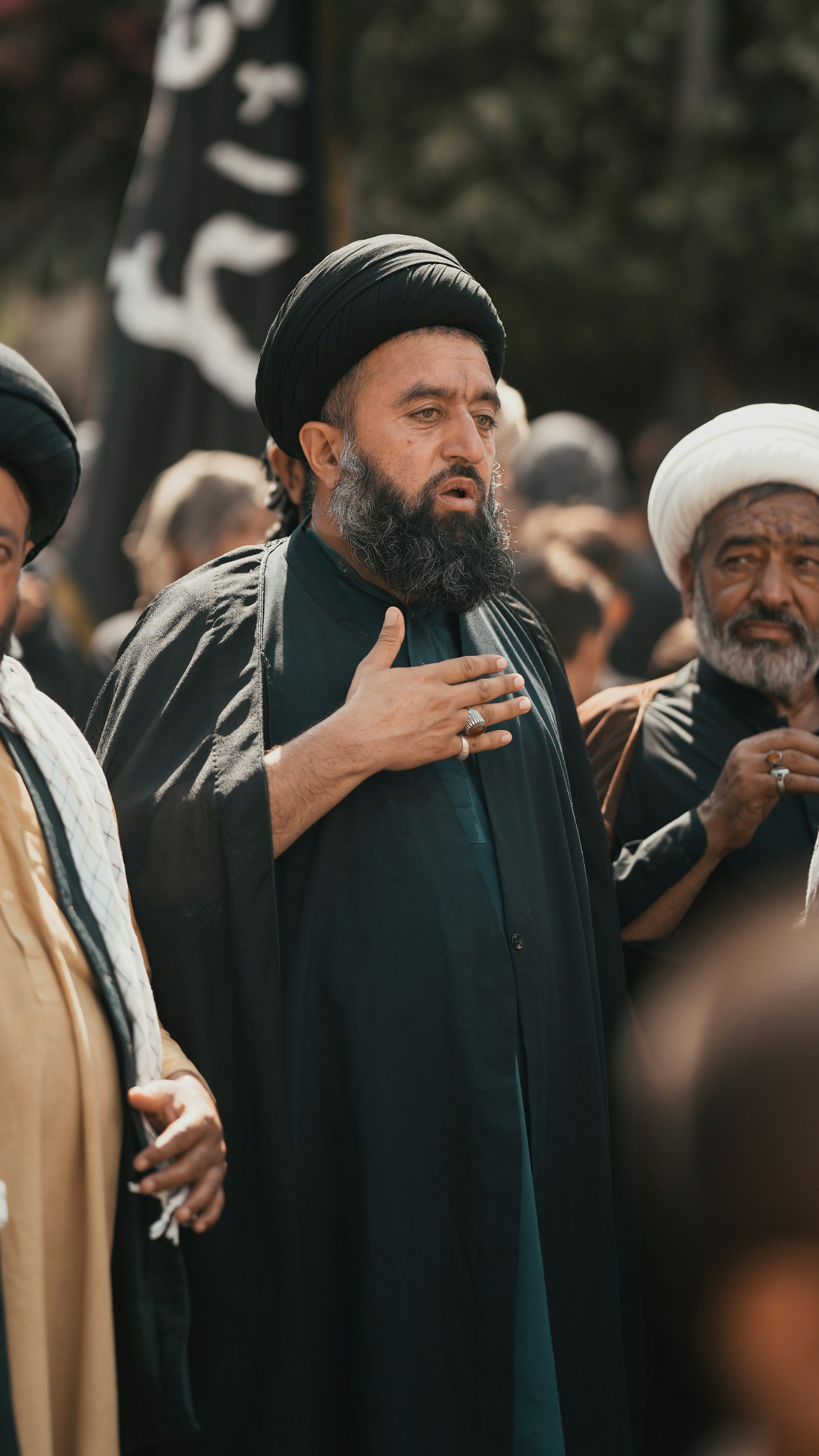 Men in traditional islamic clothing with turbans