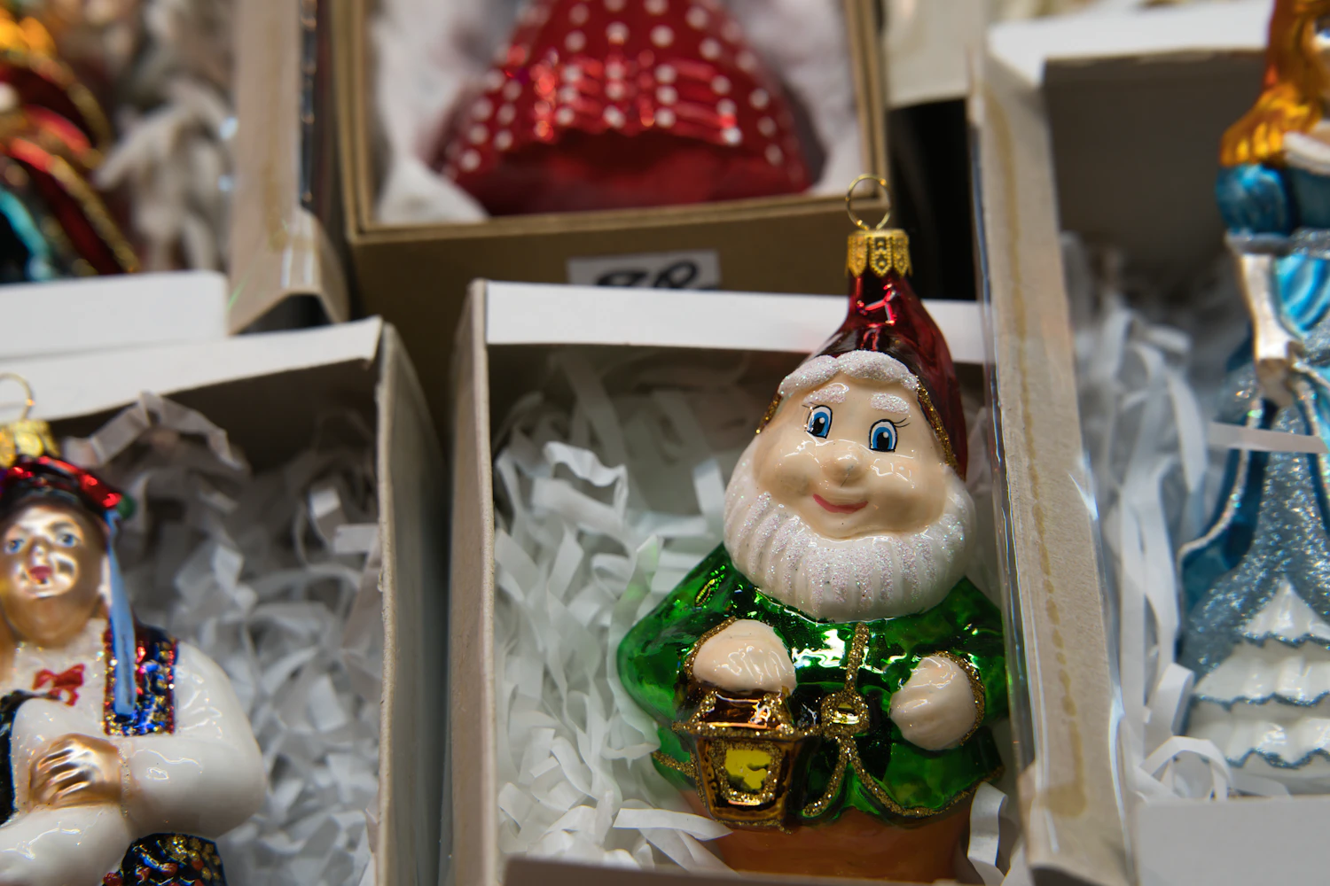Laternenzwerg glass gnome holding a lantern, packed in its gift box