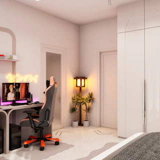 Modern gaming setup with computer and neon sign