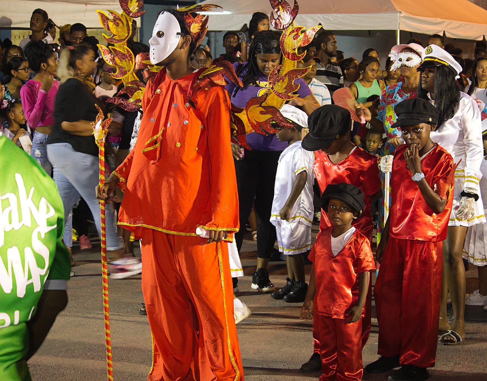 People in Carnival costumes in Chaguanas, Trinidad and Tobago; geographic context for brand research.