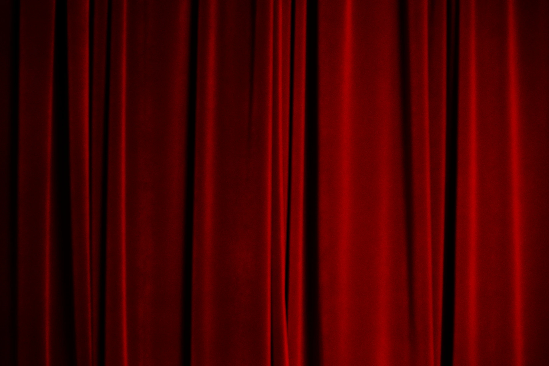 Rich red velvet theater curtains with stage curtains