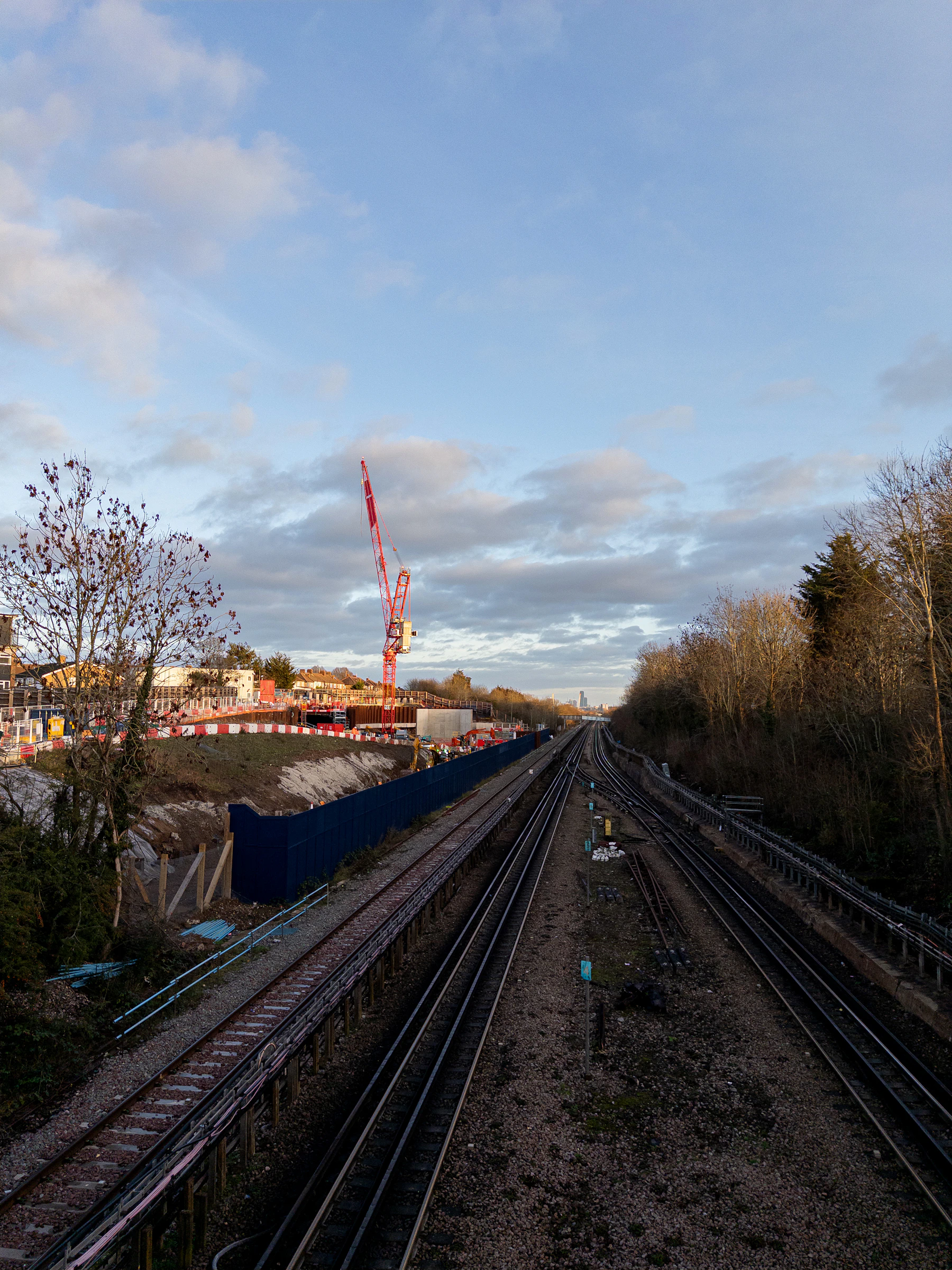 Railway tracks leading toward infrastructure development works