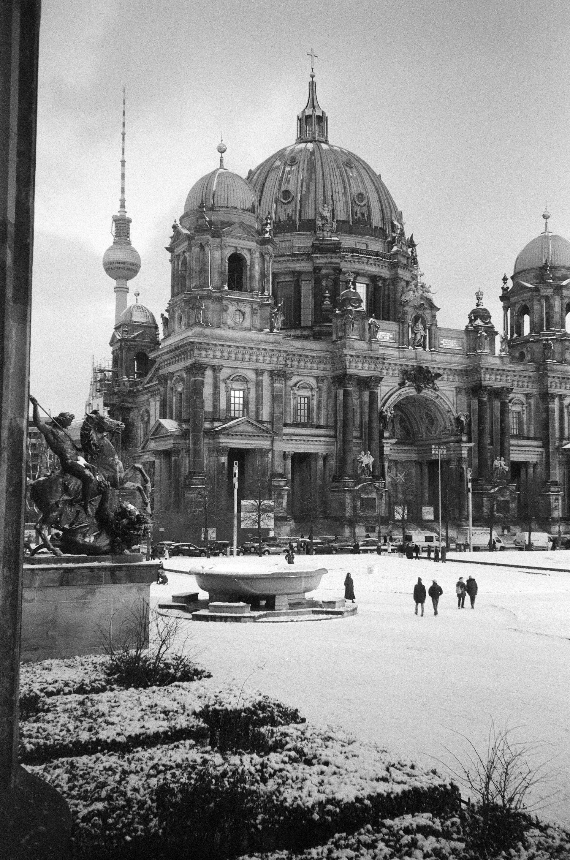 Berlin cathedral and TV tower in winter snow