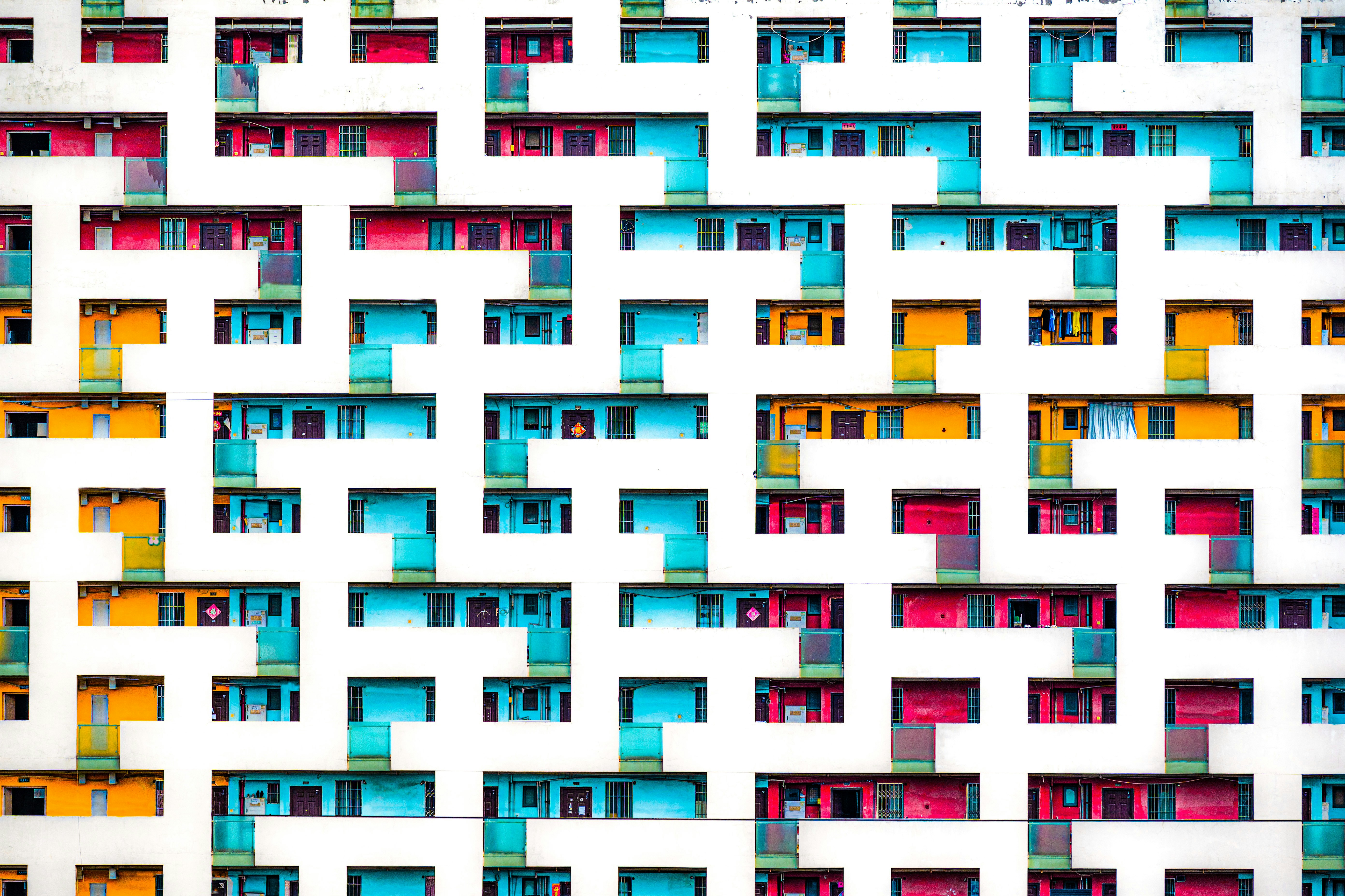 Colorful balconies form a geometric pattern on building
