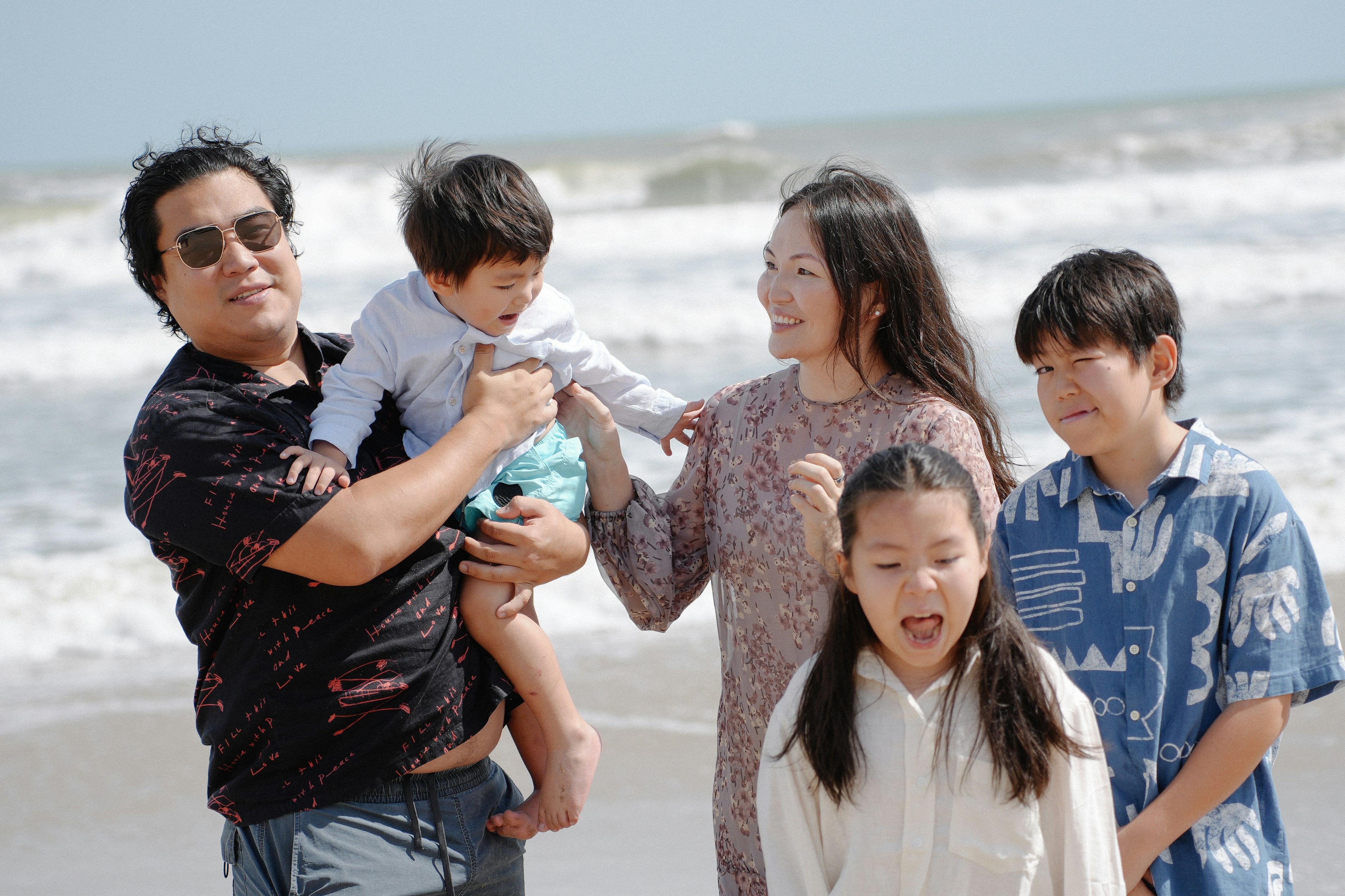 Family enjoying a day at the beach together