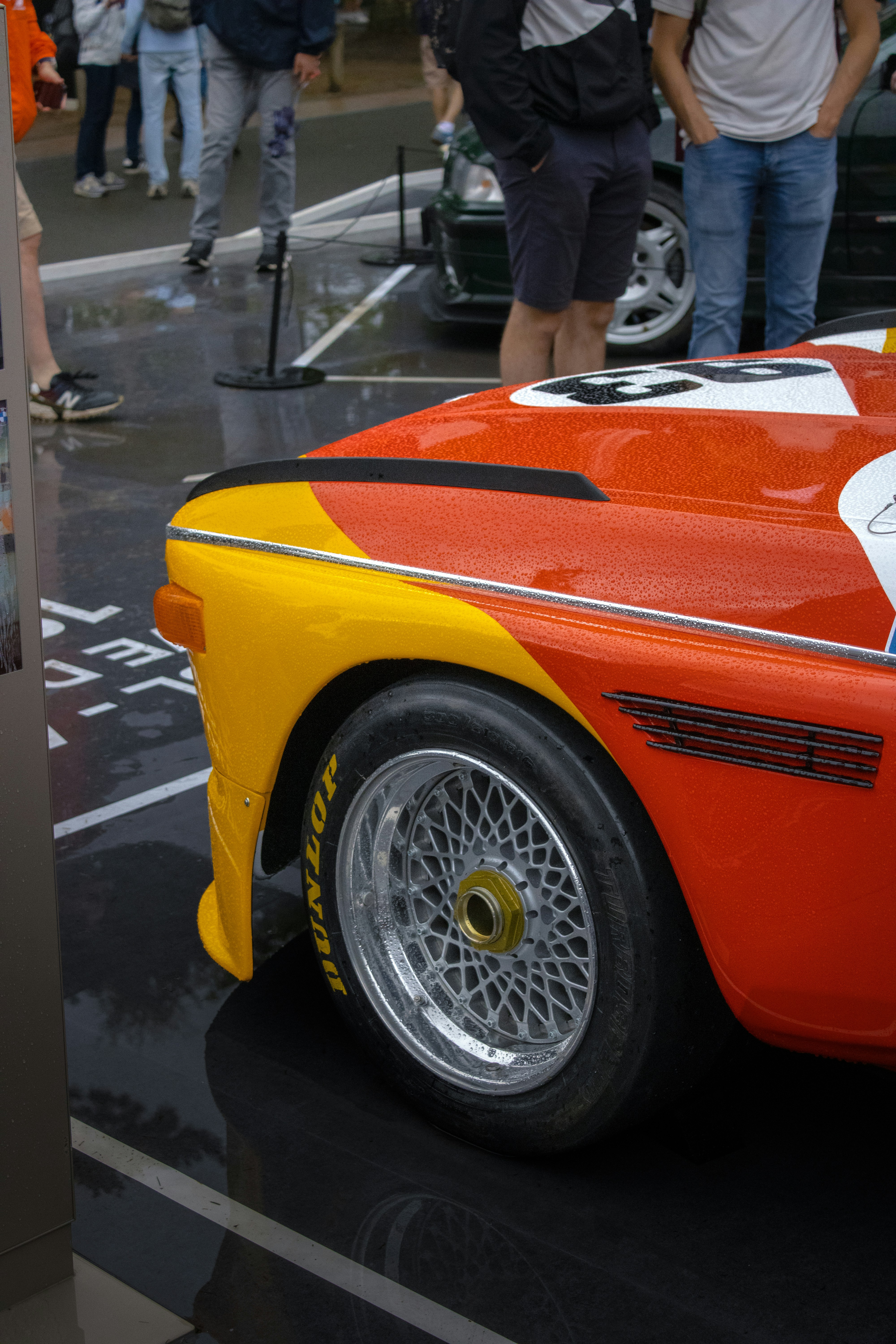 Close-up of a vintage orange and yellow race car wheel photo – Free Car ...