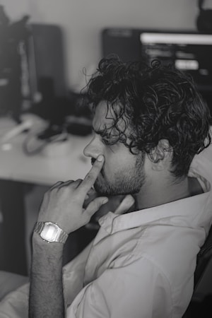 Man thinking strategically, considering options and next steps