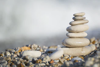 Stack of smooth stones on a pebble beach