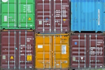 Stacked shipping containers in various colors