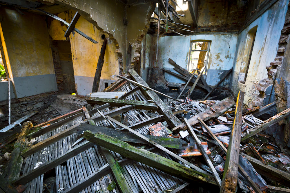 Interior of a storm-damaged building with debris