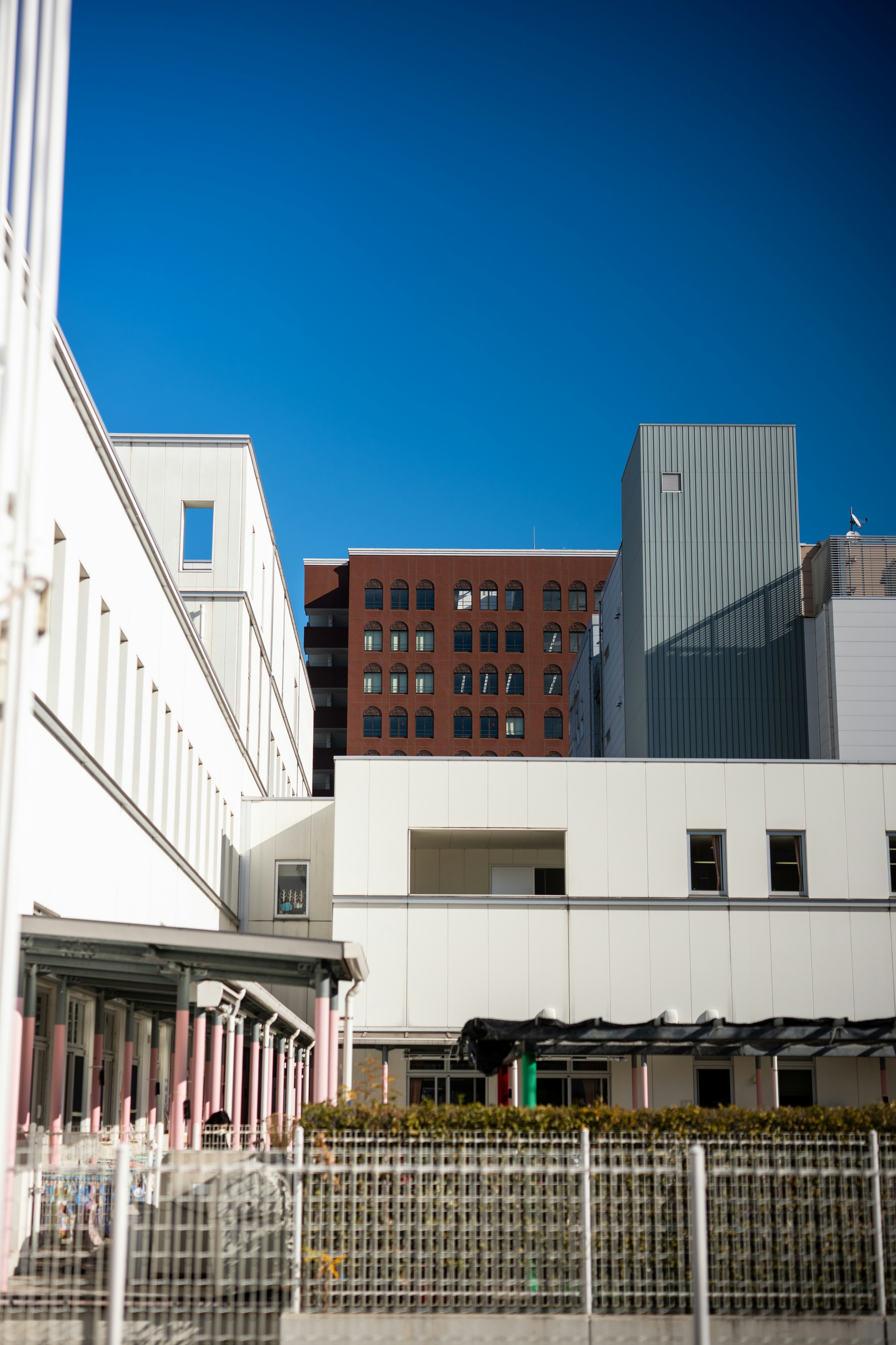 Modern buildings under a clear blue sky