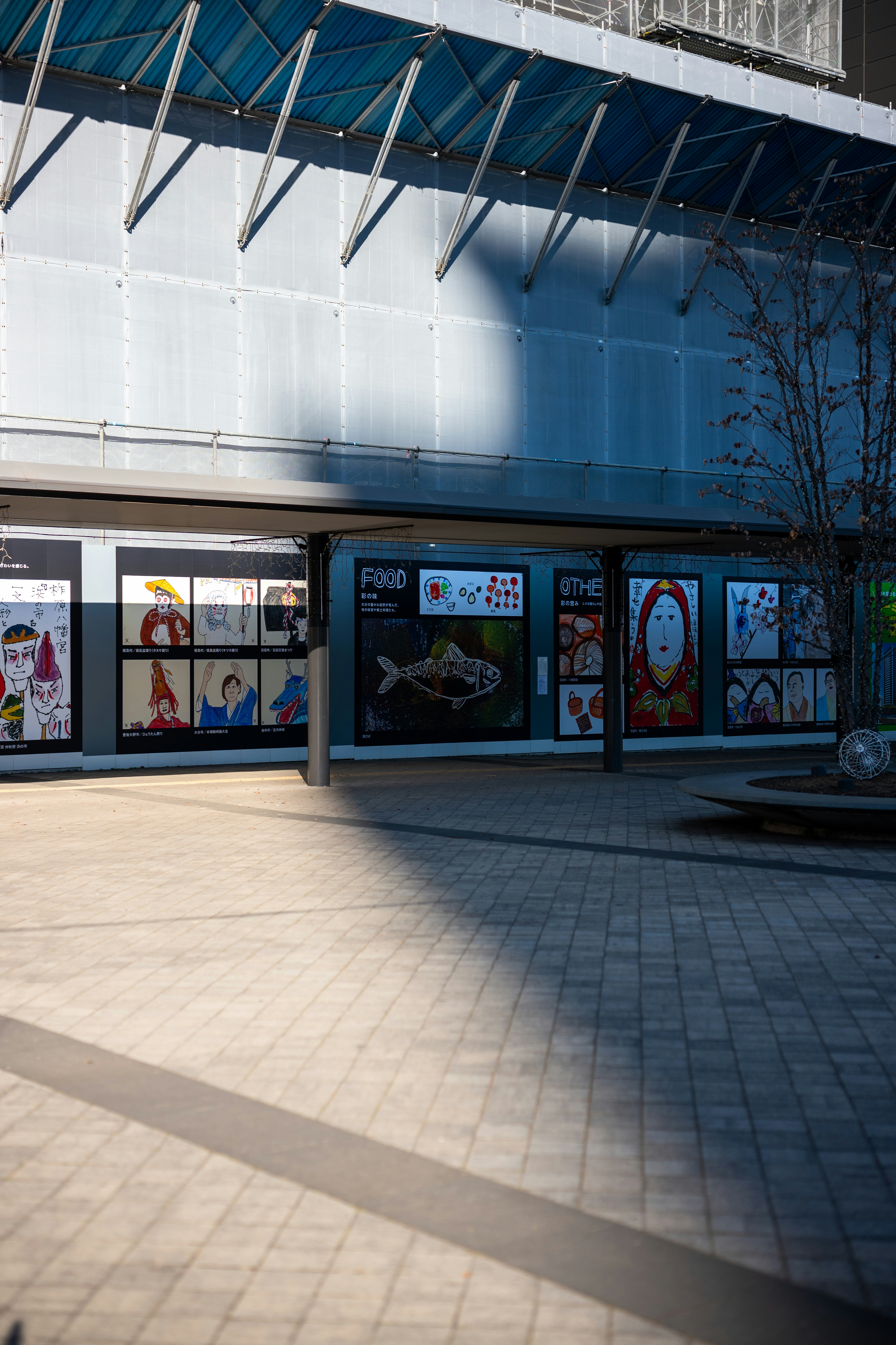 Modern building exterior with artwork displayed