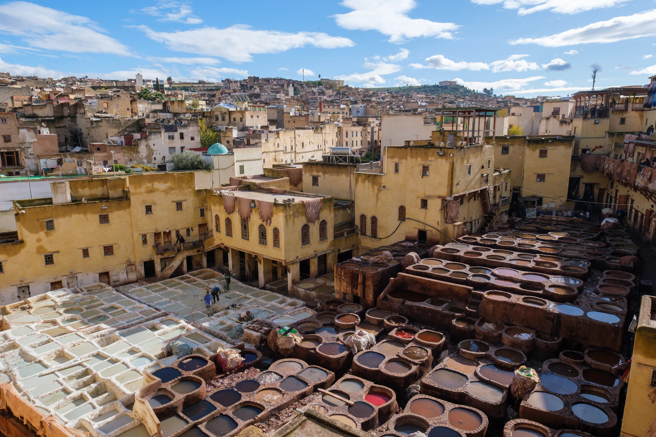 Traditional dye vats and historic buildings in Fes