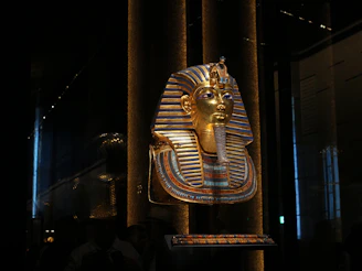 Golden funerary mask of tutankhamun on display