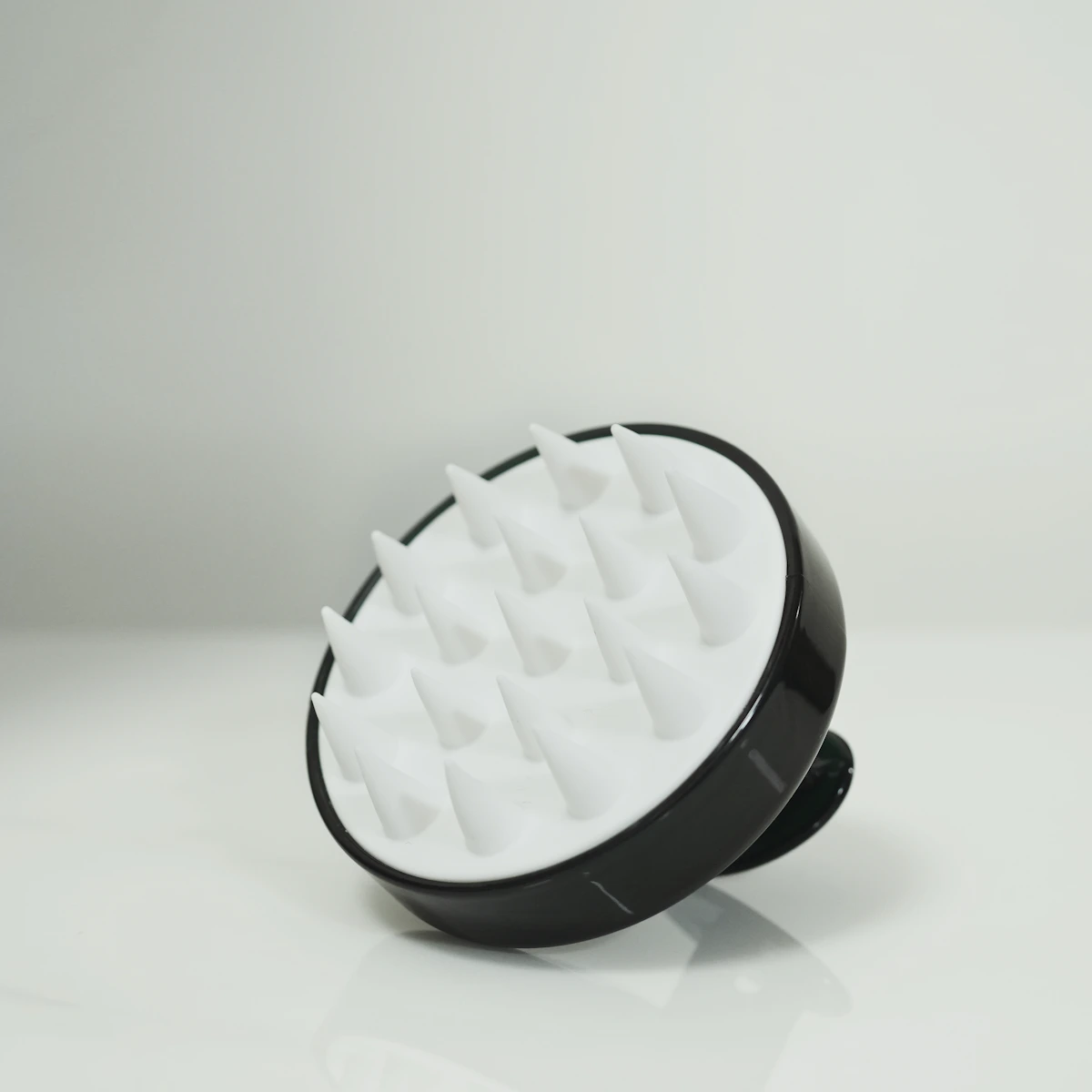 Scalp massage tool used to support scalp circulation and hair density