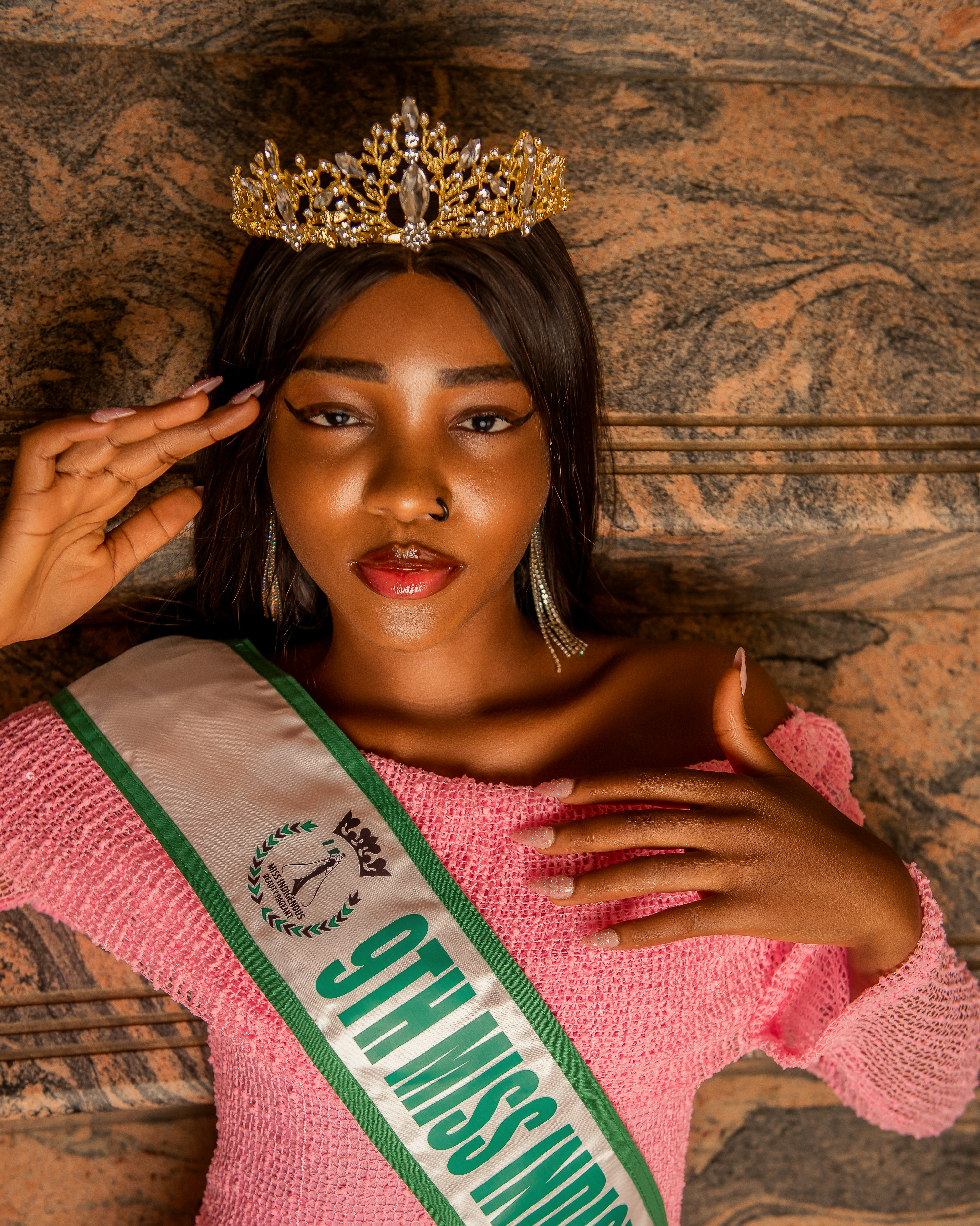 Woman wearing a crown and sash