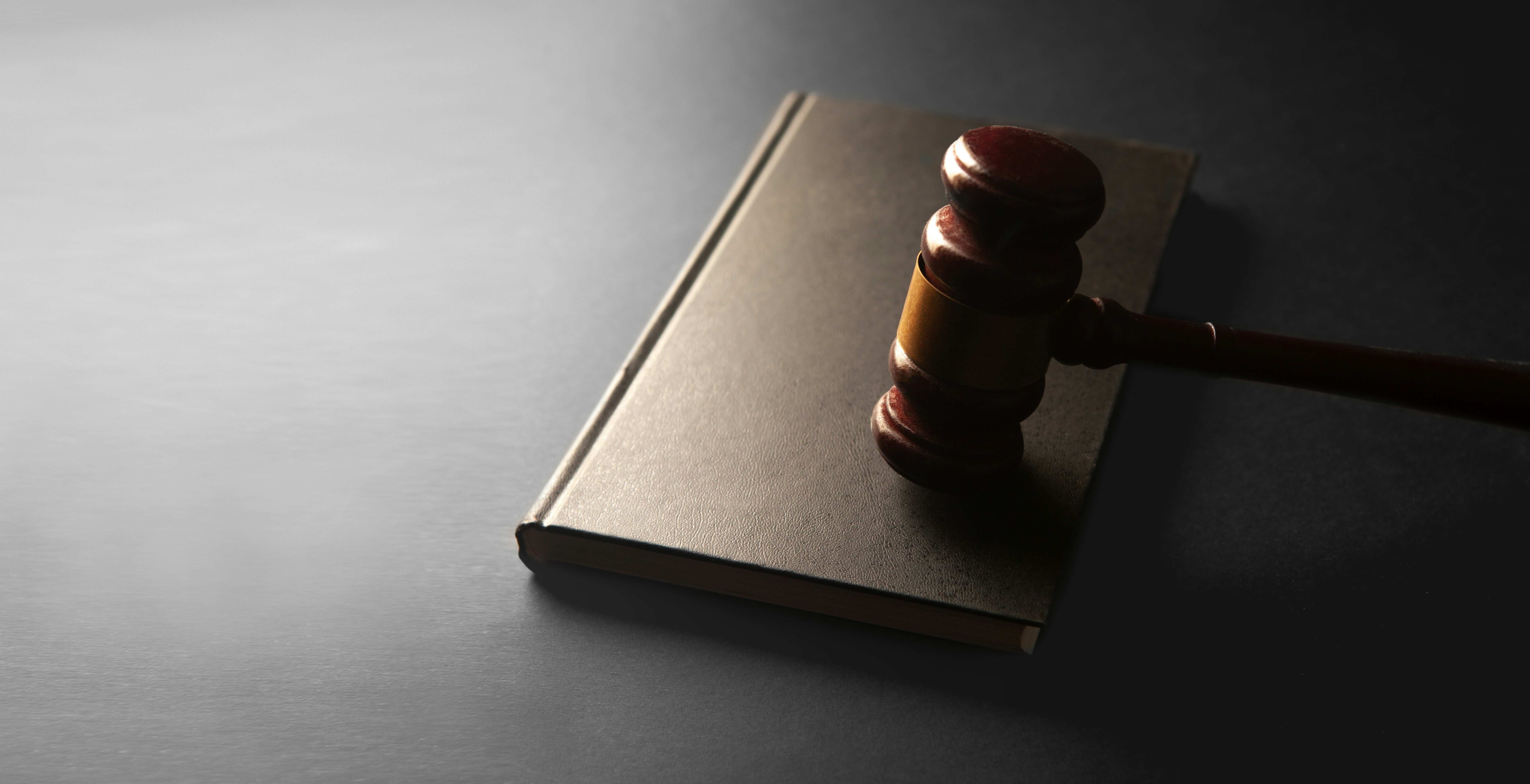 judge gavel on black background with space for text. law concept