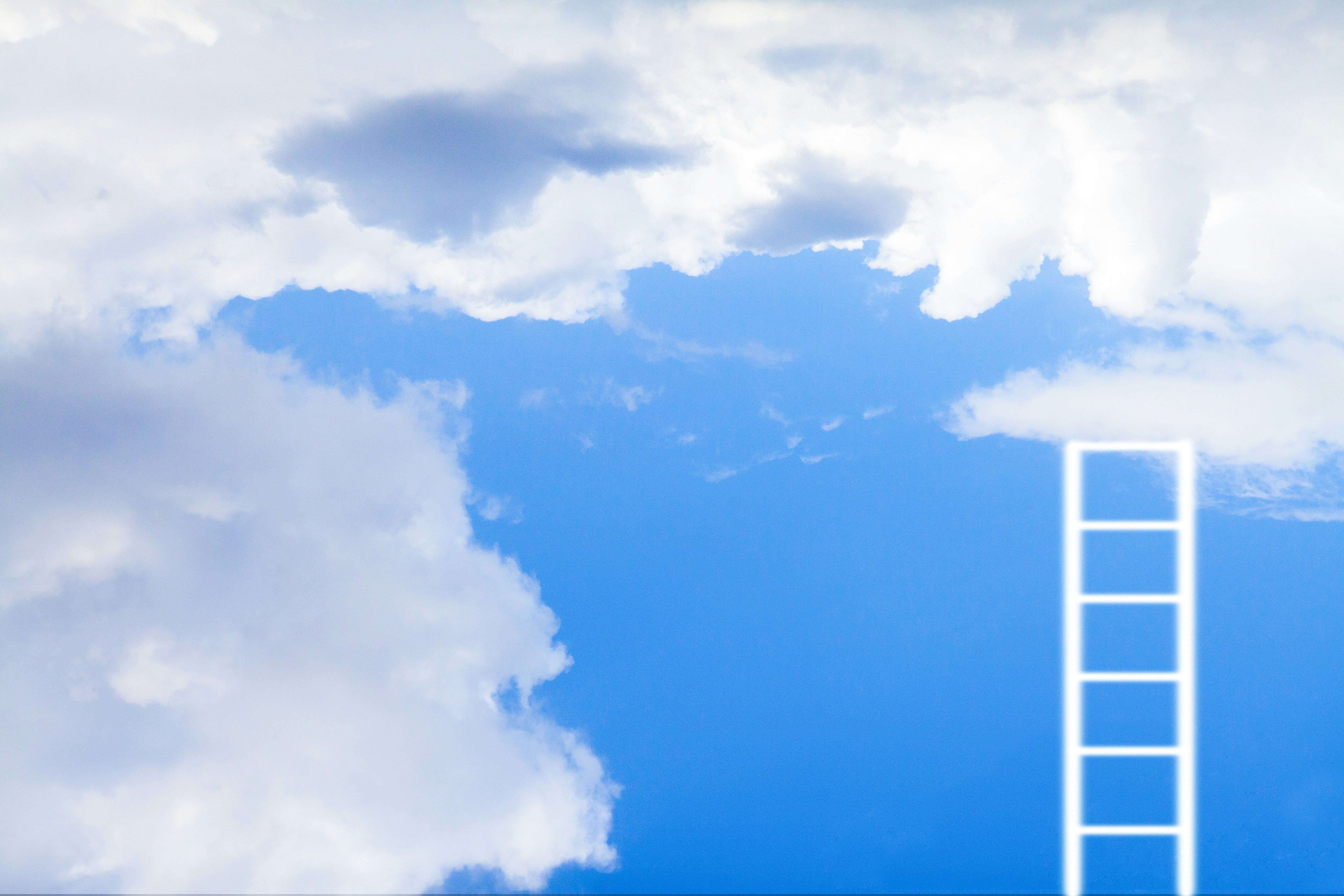 Ladder leading to the sky with white clouds on blue sky background