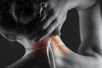 Woman's neck with highlighted pain area.