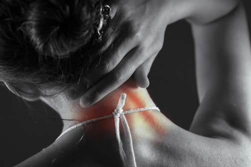 Woman's neck with highlighted pain area.